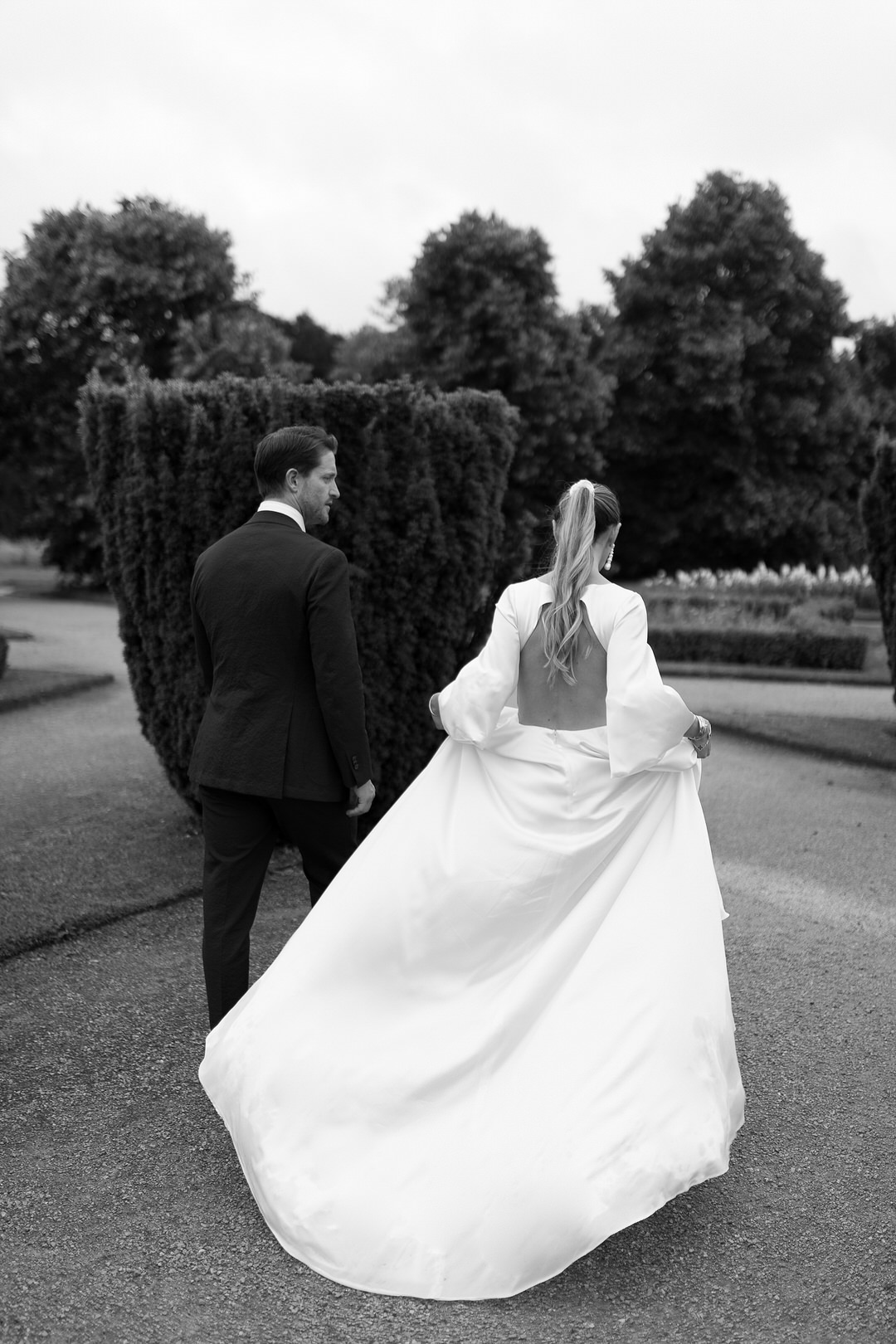 Modern vintage bride and groom in london at their gothic mansion wedding by London film wedding photographer